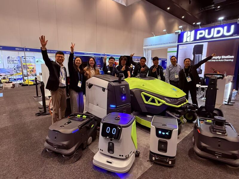ERA Robotics and PUDU Robotics teams at the ISSA Cleaning & Hygiene Expo in Melbourne with the PUDU GT Series