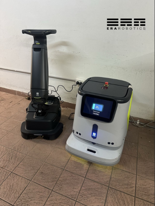 PUDU SH1 scrubber dryer and PUDU CC1 cleaning robot charging at a hotel site, from ERA Robotics' LinkedIn post